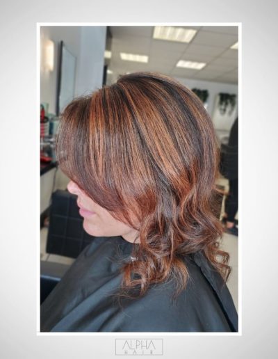 Beautiful hair transformation with copper and caramel tones at Alpha Hair Studio in Cork City