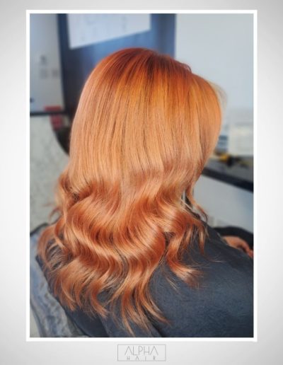 Vibrant copper hair transformation by the skilled stylists at Alpha Hair Studio in Cork City