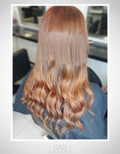 Vibrant copper hair transformation by the skilled stylists at Alpha Hair Studio in Cork City